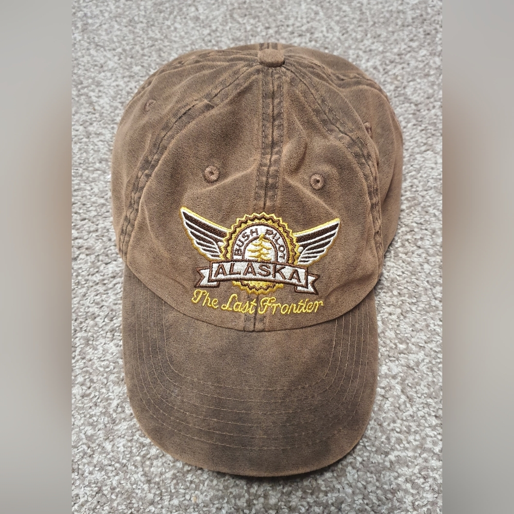 washed-cotton or "oil-rubbed" baseball cap featuring an embroidered Alaska Bush